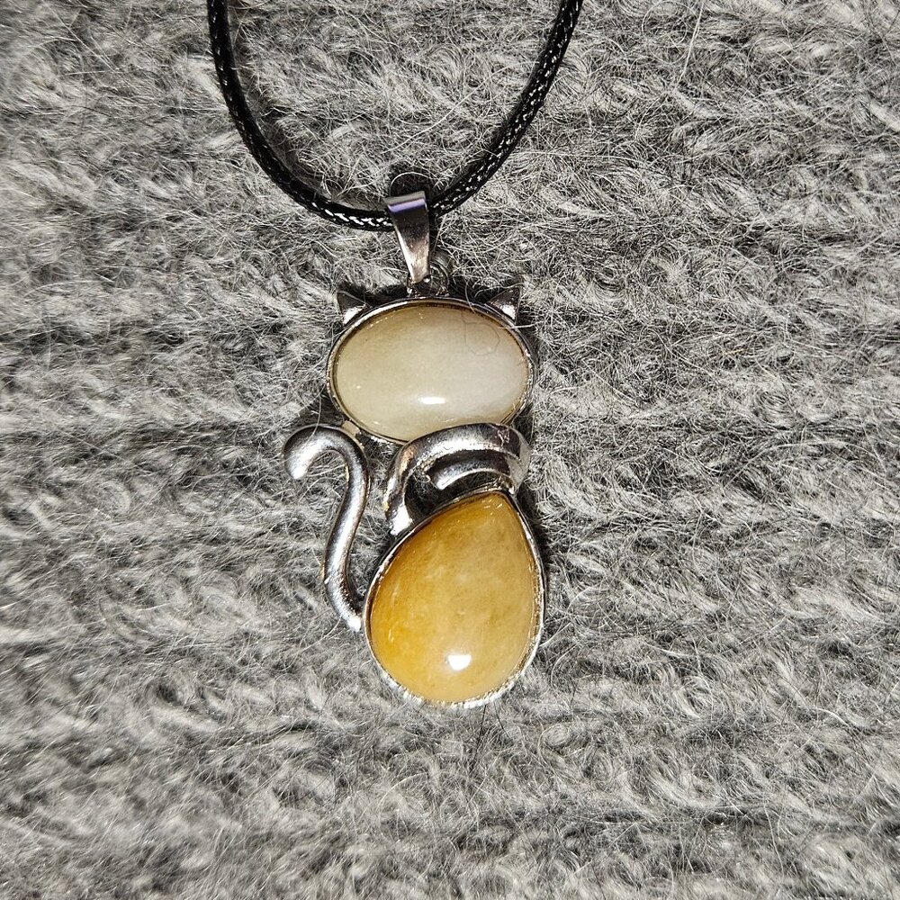 Orange aventurine gemstone/crystal cat pendant, silver plate, black cord, new